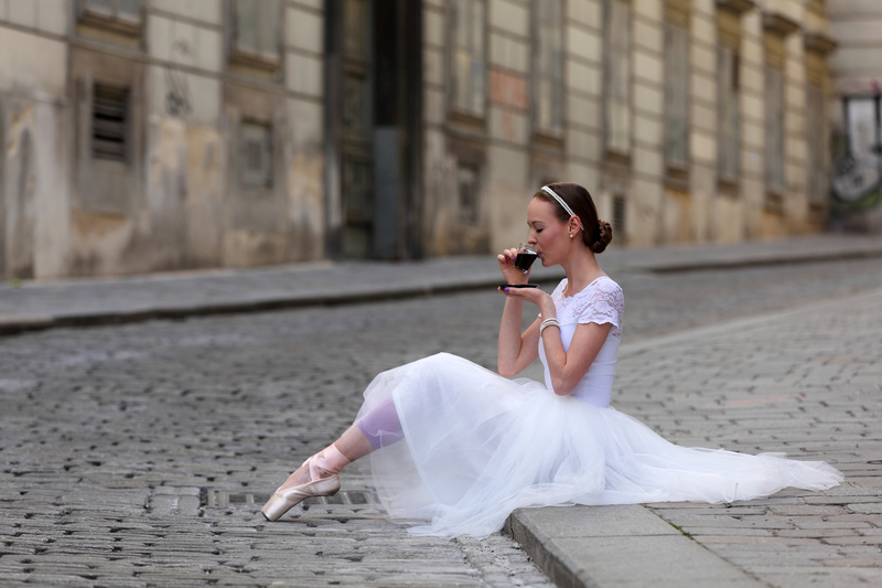 Ballerina drinking coffee